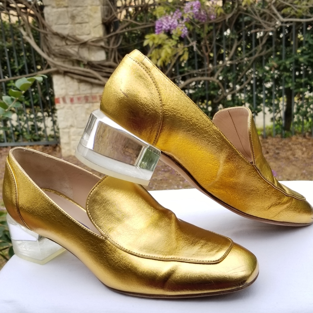 Stuart Weitzman metallic gold slip-on loafer shoes.  Size 6
